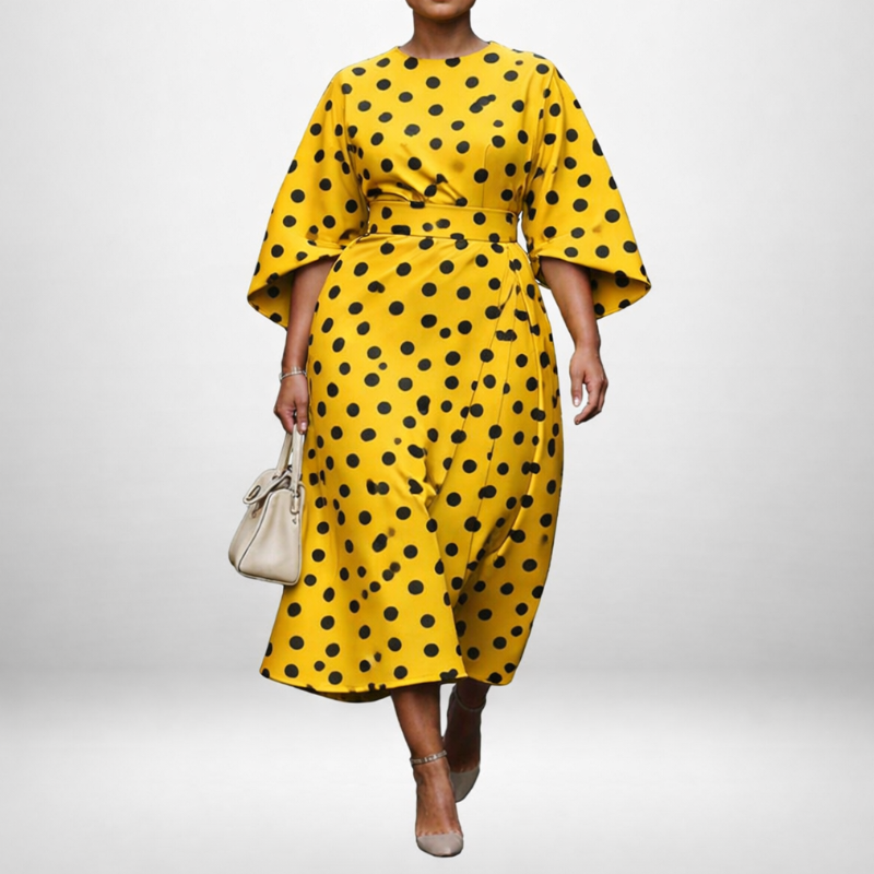 JUNIPER | Polka Dot Midi med Skulptureret Talje og Legende Elegance